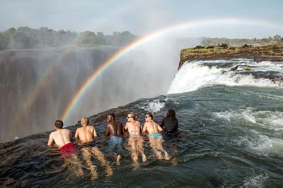 From Victoria Falls: Livingstone Island Tour & Devils Pool - The Royal Livingstone Hotel briefing and five-minute boat ride