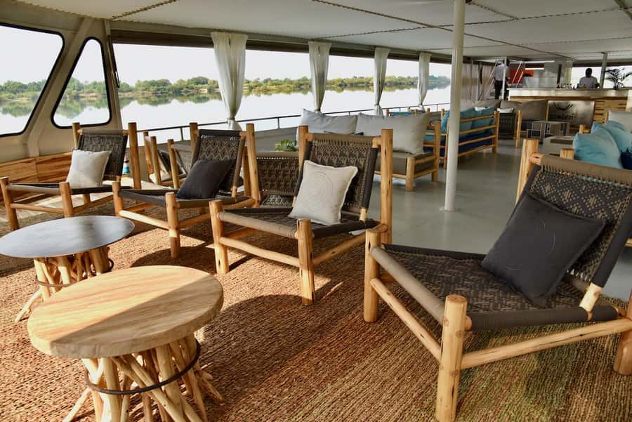 Luxury Cruise : Sunset Boat Cruise on The Zambezi Explorer - The distant Falls view needs the right expectations