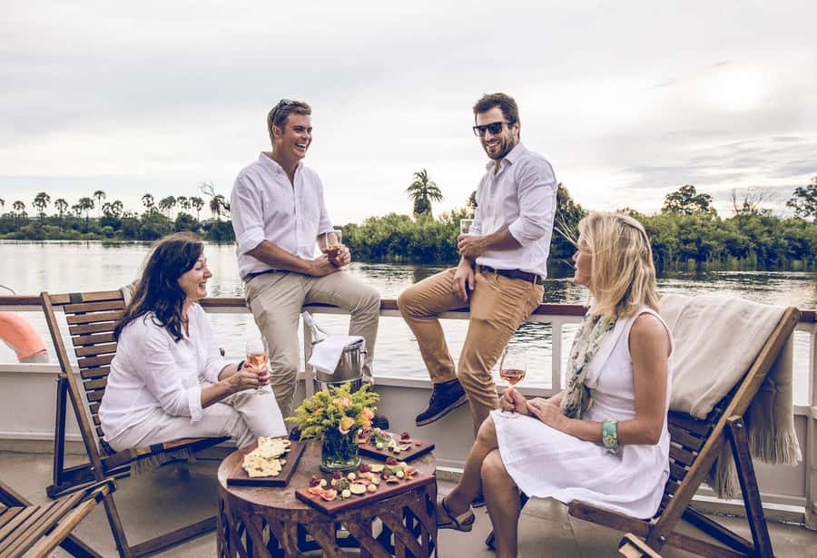 Luxury Sunset Dinner Cruise with 4-Course Meal - Cruising upstream as the light changes