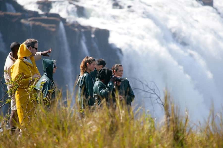 Ultimate Falls Experience - Tour, Abseil, Swim & Hike - Preparing for a 110-meter abseil