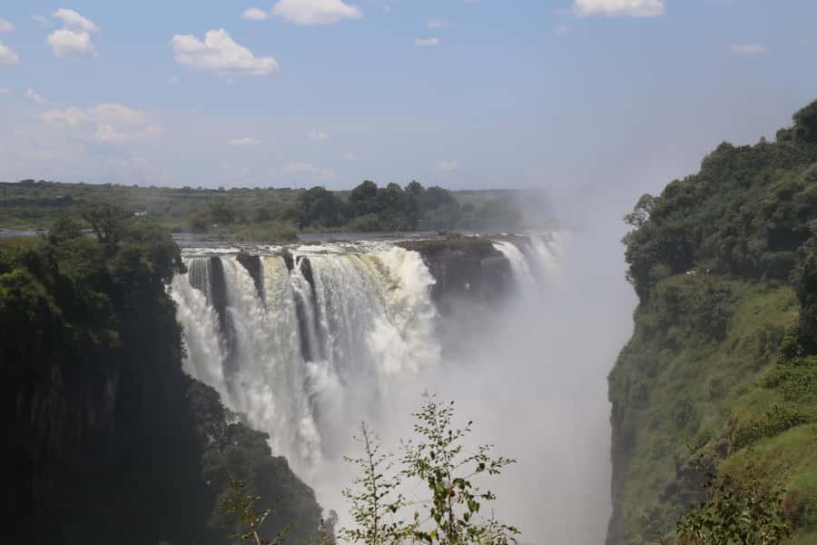 Victoria Falls Private Tour with Lunch & Helicopter Flight - Walking through all 16 Victoria Falls viewpoints