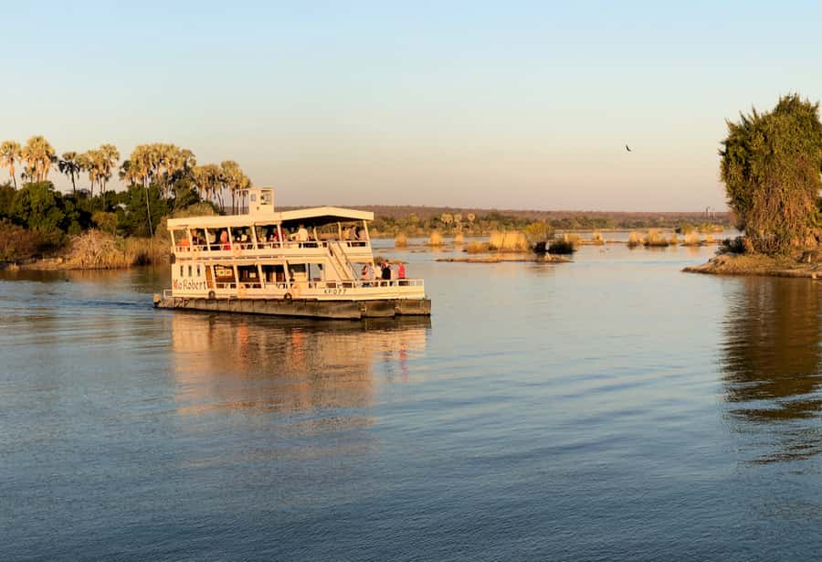 Victoria Falls Scenic Guided Tour with Sunset Boat Cruise - Big Tree and the road to the rainforest park
