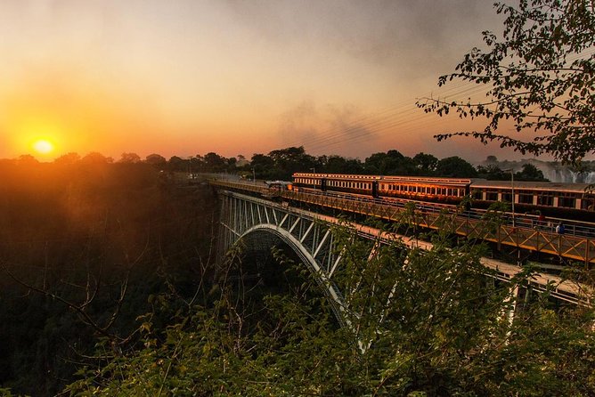 Victoria Falls Steam Train Dinner - Riding Loco 512 toward the bridge