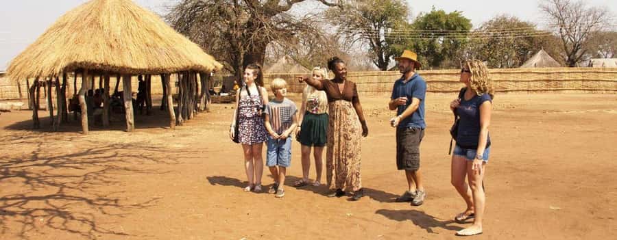 Victoria Falls: Village Tour with Traditional Food Tasting - Key points at a glance