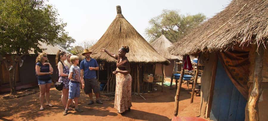 Victoria Falls: Village Tour with Traditional Food Tasting - Meeting local people in Monde Village